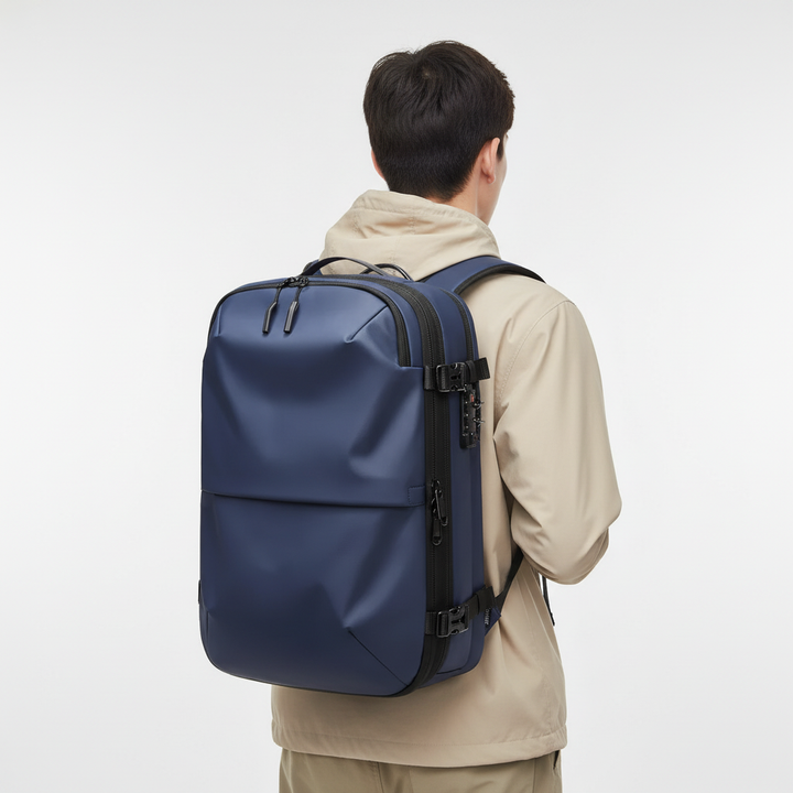Expandable travel backpack with dedicated laptop sleeve & wet/dry compartment. Unisex design, perfect for all weather.