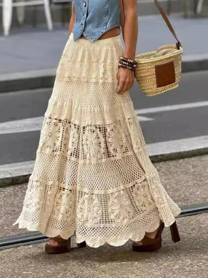 Elegant women's crochet lace maxi skirt, perfect for bohemian summer outfits & beach vacations.