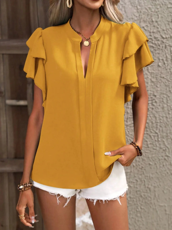 Simple yet chic women's ruffled short sleeve blouse, an essential versatile top for any wardrobe.