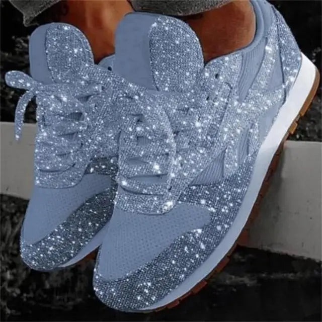 Glamorous women's glitter platform sneakers with a trendy chunky sole, perfect for fashion-forward style.