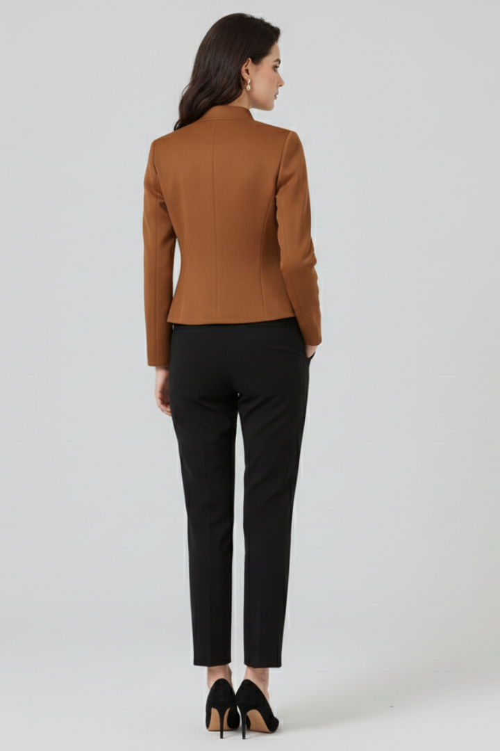 Side profile of a women's tailored blazer, offering a chic, fitted look for business casual & elegant outerwear.