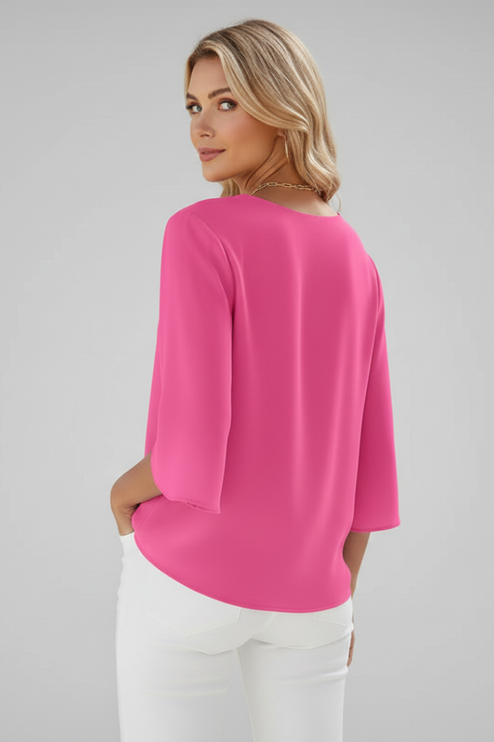 Relaxed fit elegant V-neck short-sleeve blouse, a comfortable wardrobe staple for women.