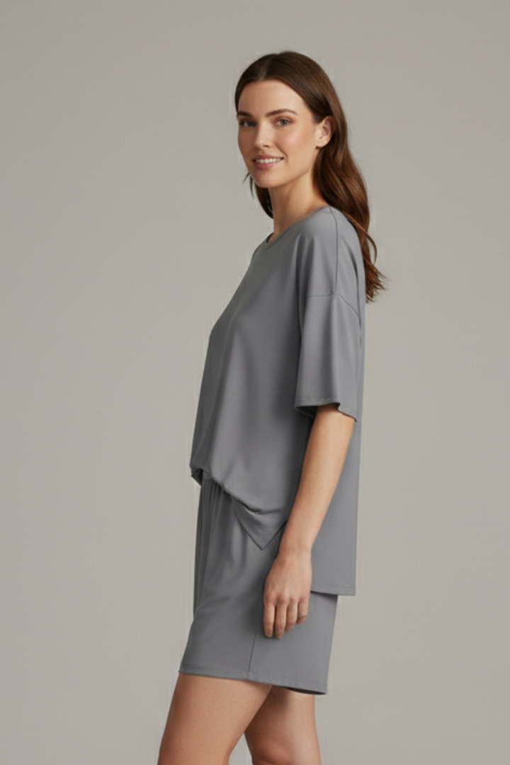 Relaxed fit women's casual set: crew neck top & loose shorts, ideal for comfortable summer wear.