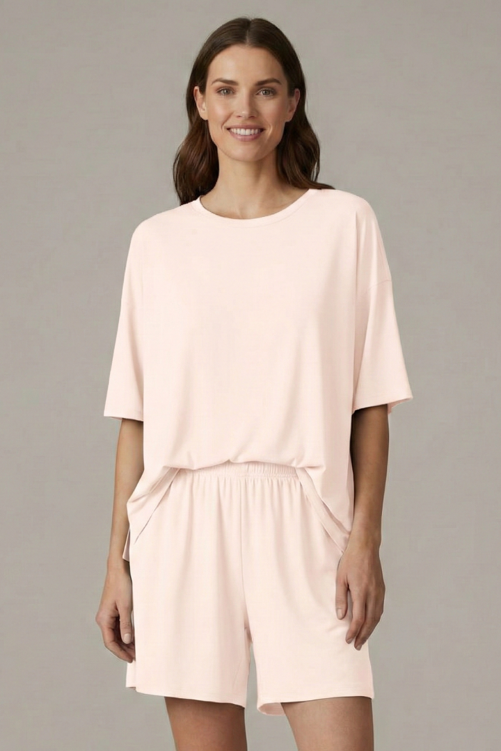 Ultra-comfortable women's summer set: casual crew neck top & loose elastic waist shorts.