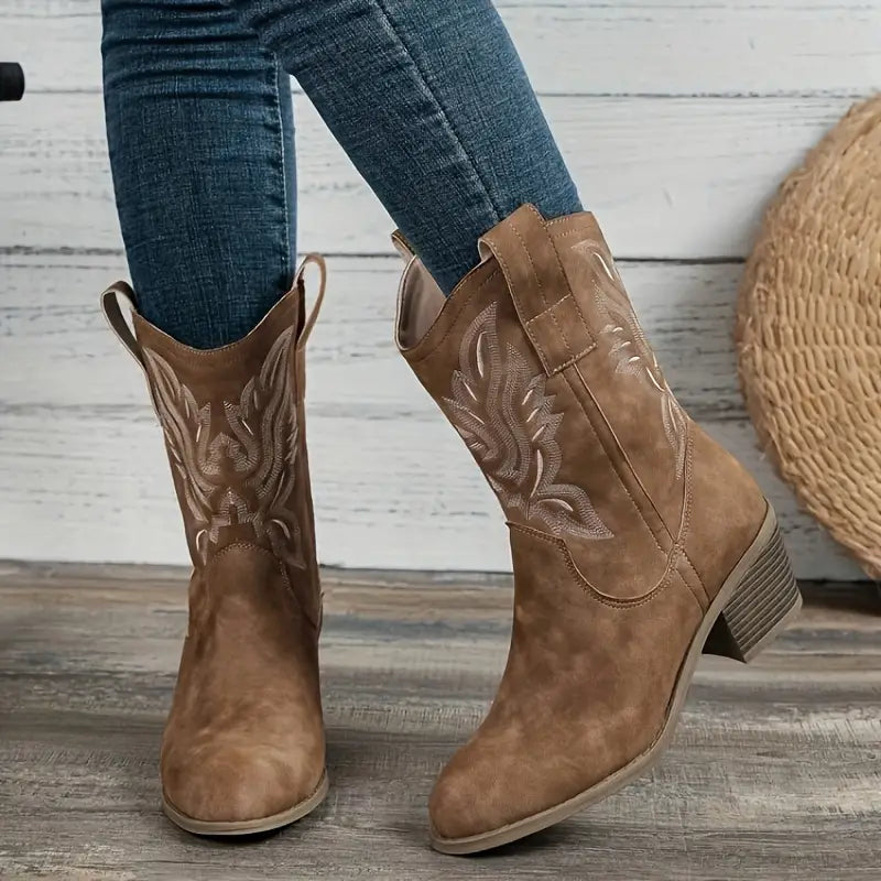 Stylish women's camel western boots with a comfortable block heel and intricate embroidery. Perfect everyday cowgirl fashion.