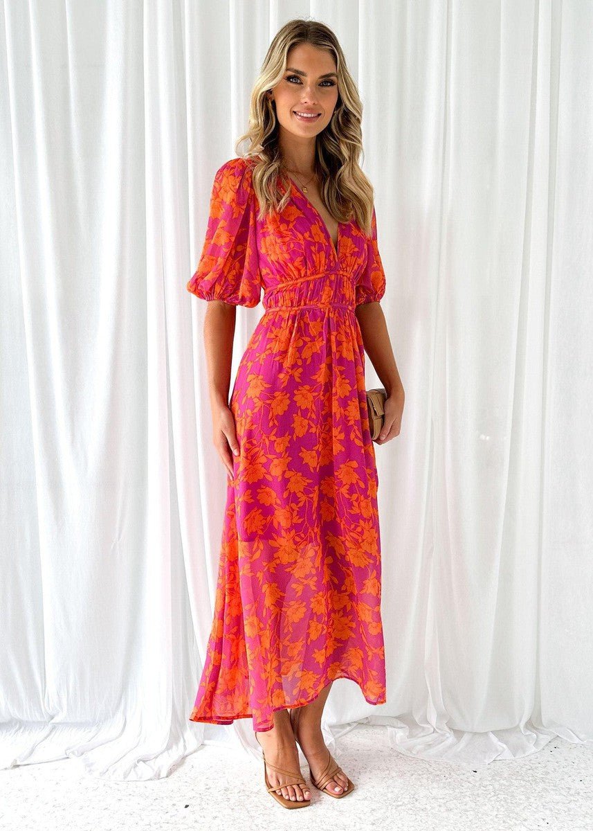 Versatile women's floral print midi dress, featuring a flattering V-neck and elegant puff sleeves for any occasion.