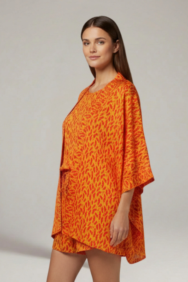 Stylish women's printed jacket & shorts set. Effortless open-front jacket with comfy elastic waist shorts.