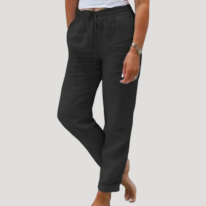 Comfortable women's casual linen trousers with an elastic waist, perfect for summer relaxation & everyday style.