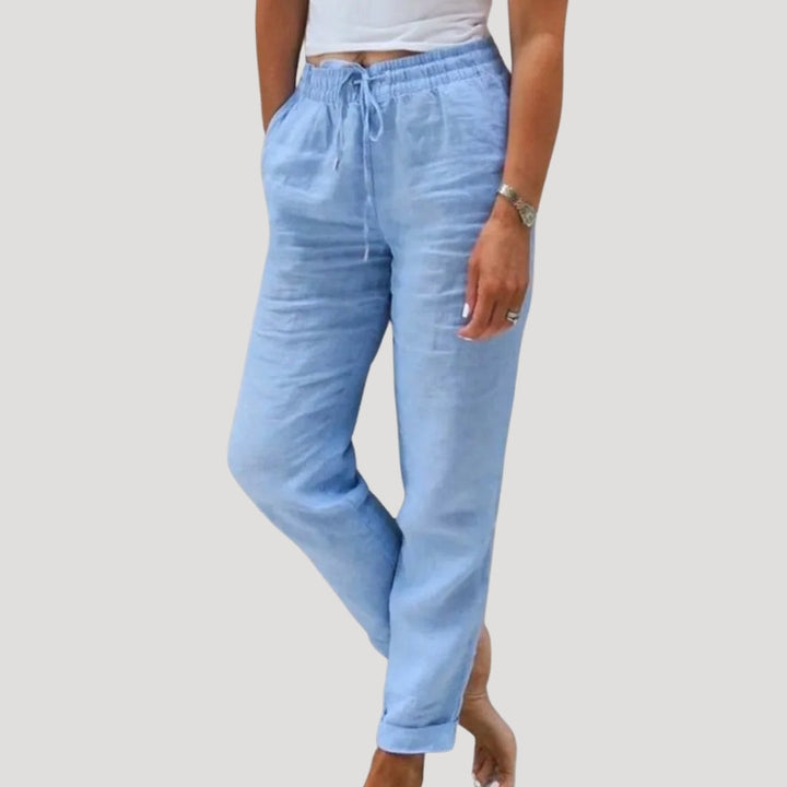 Lightweight women's tapered linen trousers with elastic waist & drawstring, essential summer bottoms.