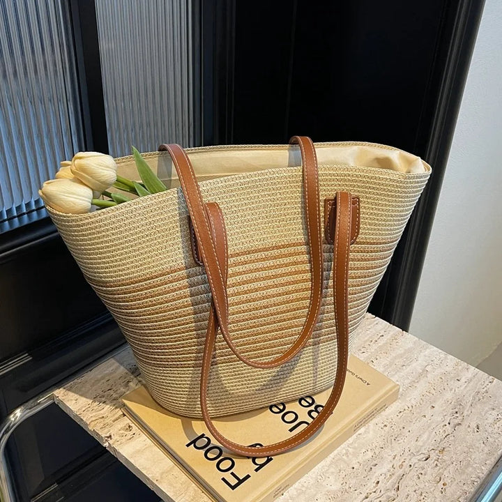 Versatile neutral two-tone tote bag for women, ideal as a beach bag or everyday shoulder bag.
