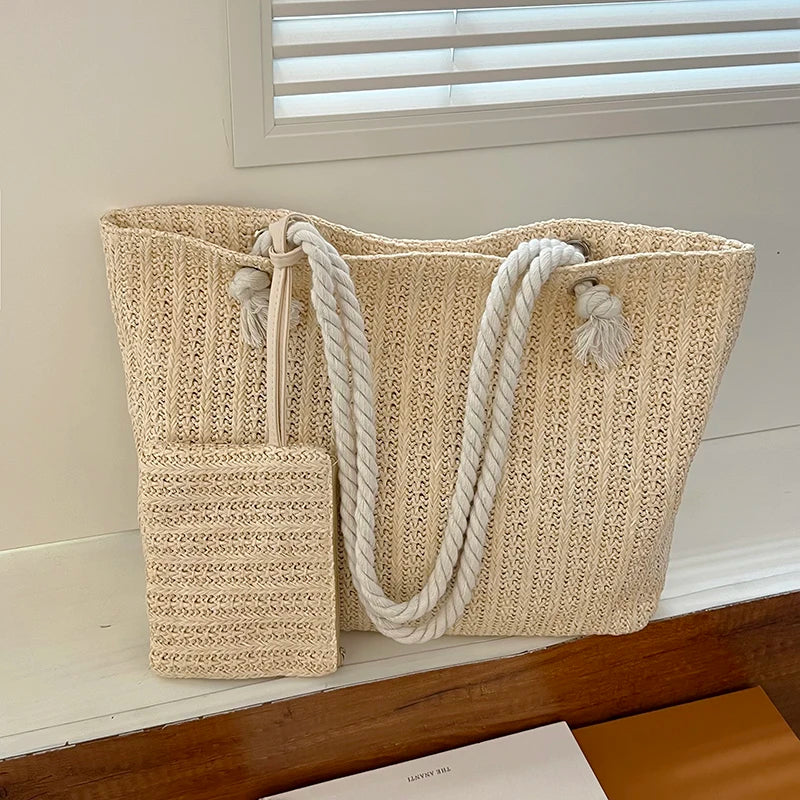 Women's large beach tote bag with a nautical rope handle design, perfect for vacation and casual wear.