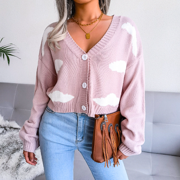 Fashionable women's cloud print V-neck cropped cardigan. Button-up knitwear, a perfect statement piece.