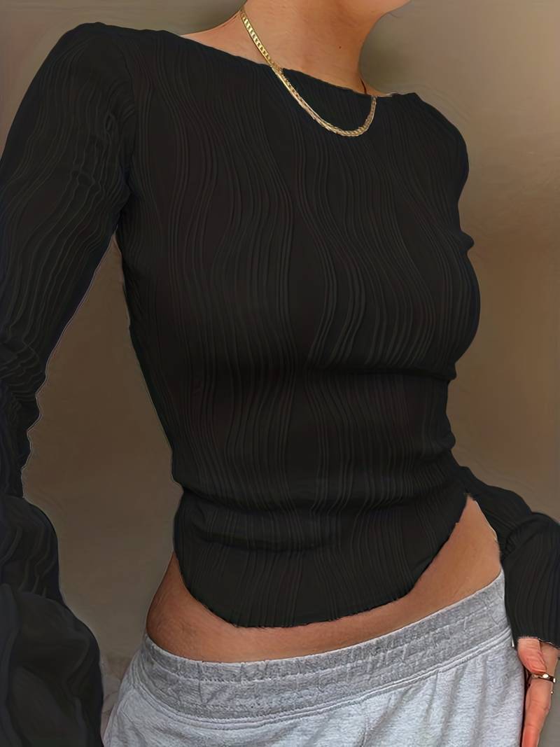 Stylish women's cropped top, long sleeves with puff cuffs & wave texture. Versatile for casual or evening wear.