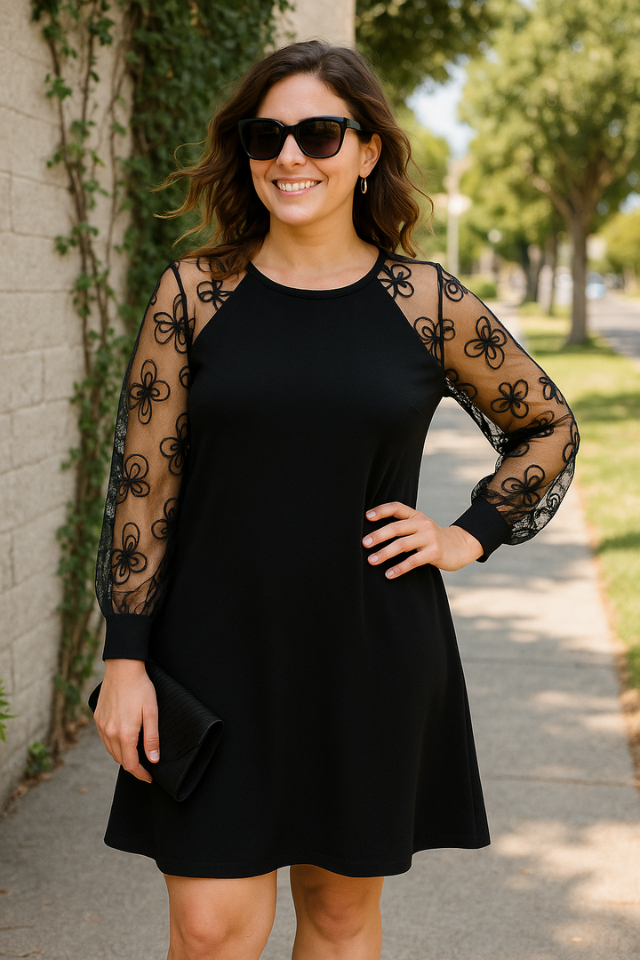 Sophisticated women's A-line evening gown with flattering fit and detailed floral embroidered sheer sleeves.