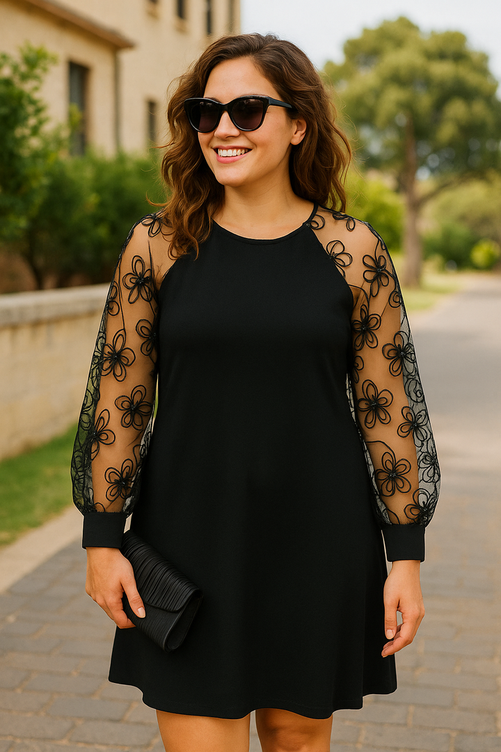 Women's elegant A-line formal dress with intricate embroidered sleeves, perfect for evening or special occasions.