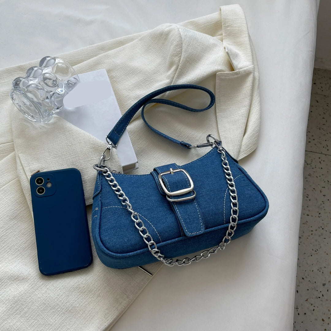 Stylish women's buckle accent handbag, a chic shoulder and crossbody bag for modern fashion.