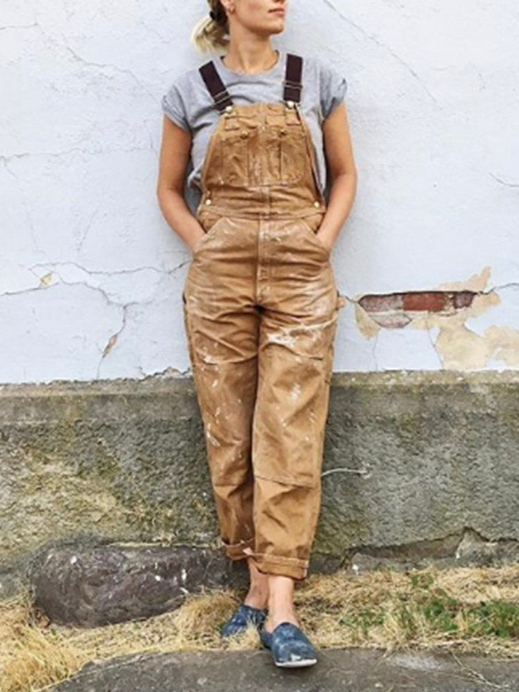 Chic women's utility jumpsuit with modern workwear fashion details; perfect for versatile casual outfits.
