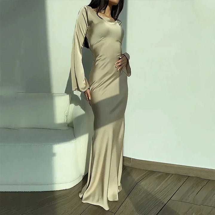 Refined women's long sleeve floor-length maxi dress, perfect as an elegant formal evening gown or wedding guest dress.