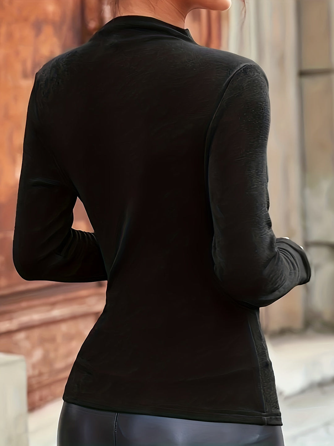 Chic women's long-sleeve mock neck top with elegant ruching. Sculpt & style your look effortlessly. Versatile apparel.