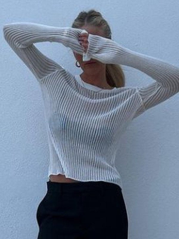 Stylish women's long sleeve top, sheer ribbed knit, fitted silhouette. A versatile and elegant layering piece.
