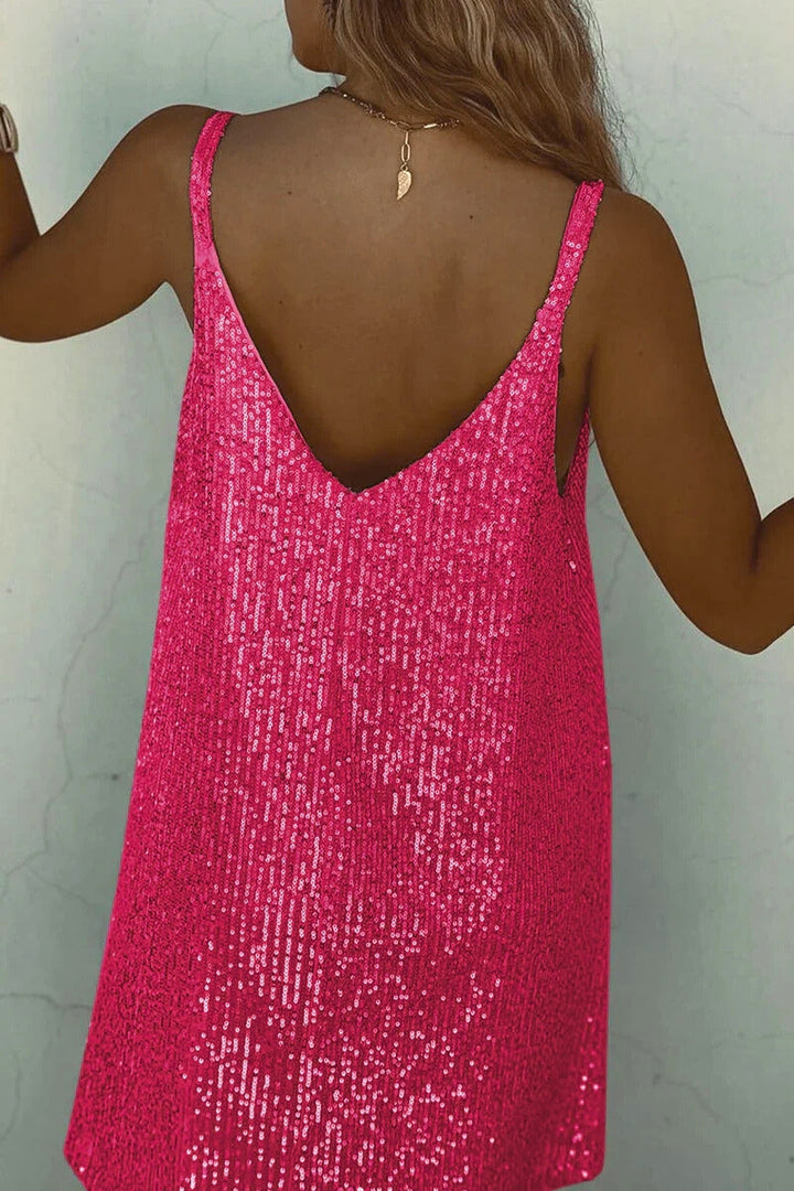 Festive women's sequin V-neck mini dress. A glamorous choice for parties, cocktails, and special evenings.