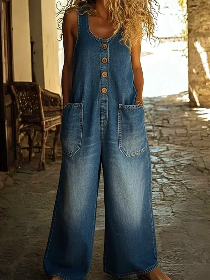 Comfortable women's wide-leg denim overalls featuring a button front and stylish utility pockets for everyday wear.