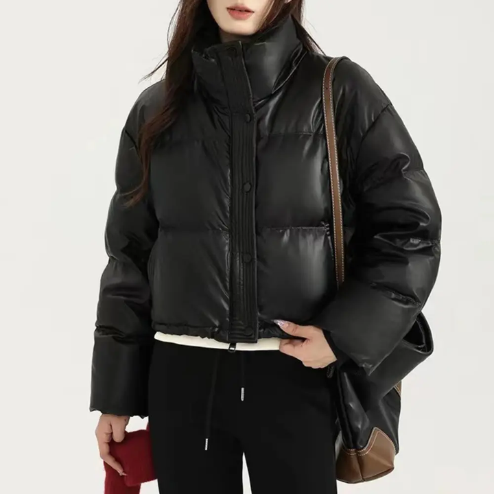 Stylish women's cropped puffer jacket, perfect winter outerwear with a chic stand collar & snap buttons.