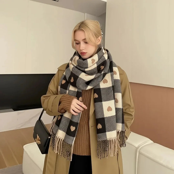 Fashionable women's heart print winter wrap scarf, complete with cozy tassels for ultimate cold-weather style.