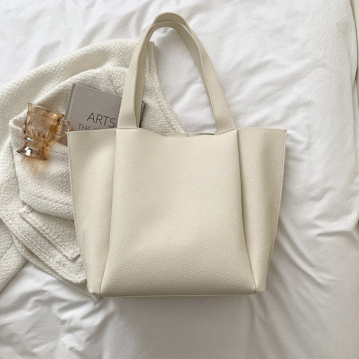 Structured women's large shoulder tote bag, elegant and spacious. A perfect work bag & fashion accessory for women.