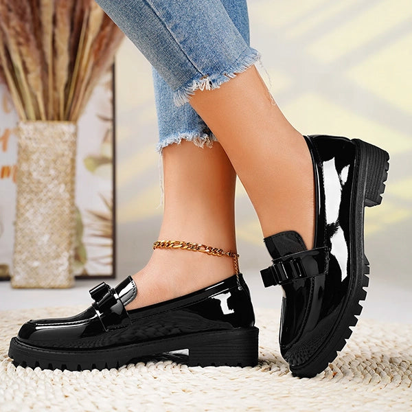 Glossy women's slip-on loafers with chic bow, chunky platform sole. Perfect versatile casual & dress footwear.