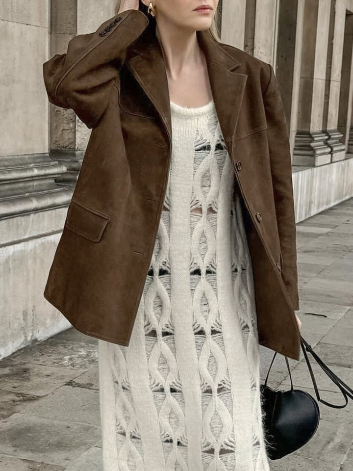 Stylish women's oversized button-front suede jacket, a versatile chic outerwear piece for fashion-forward looks.