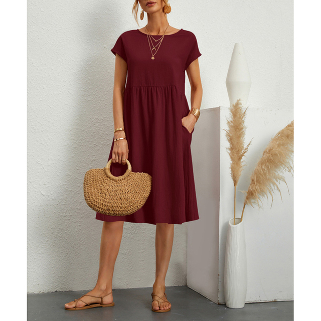 Stylish short sleeve round neck midi dress for women, great as a comfortable vacation or beach dress.