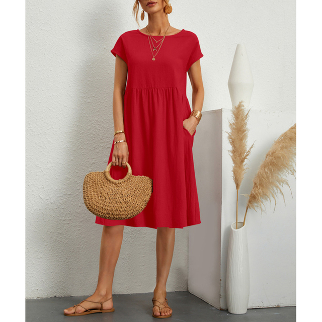 Women's short sleeve midi dress in a breezy fabric, offering comfort & effortless style for summer.