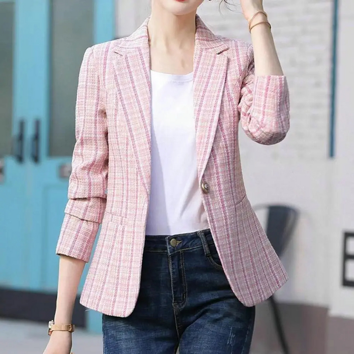 Sophisticated women's tailored plaid blazer. Notched lapel, long sleeves. Versatile jacket for office & casual chic.