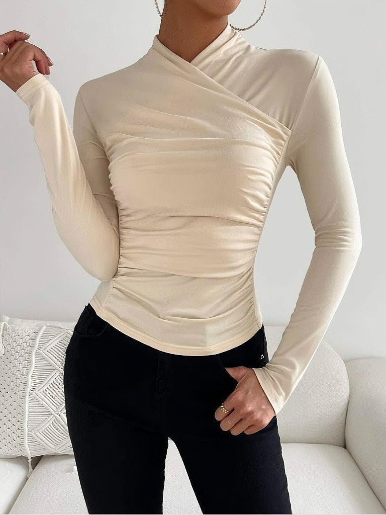 Elegant women's long sleeve wrap neck top. Fitted design for a chic look, versatile for office and casual fashion.