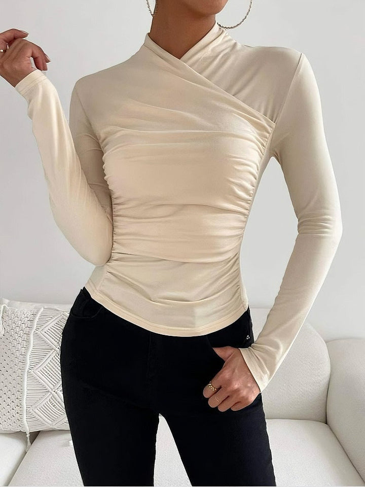Elegant women's long sleeve wrap neck top. Fitted design for a chic look, versatile for office and casual fashion.