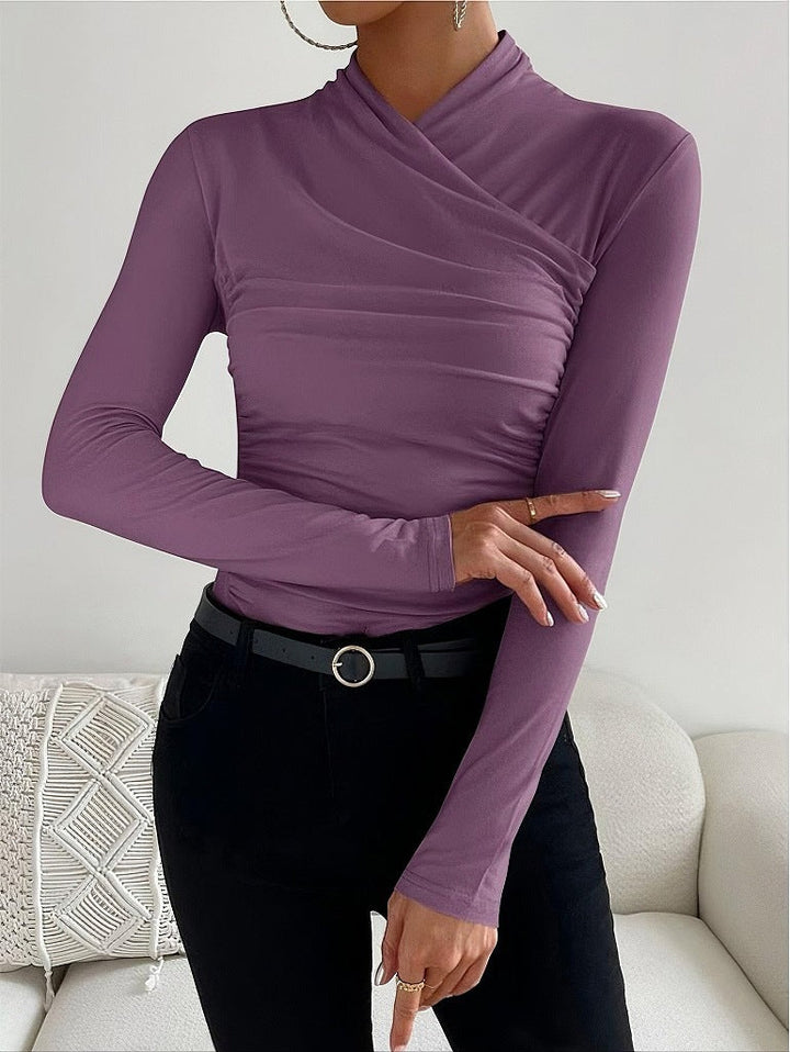Stylish women's tight shirt with a chic wrap neck & long sleeves. Offers modern elegance & comfort for everyday wear.