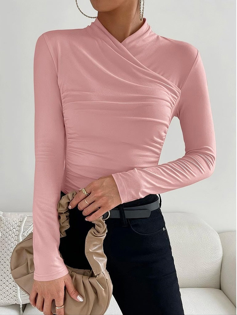 Fitted women's long sleeve blouse with elegant wrap neck. A versatile tight top for sophisticated casual & office outfits.