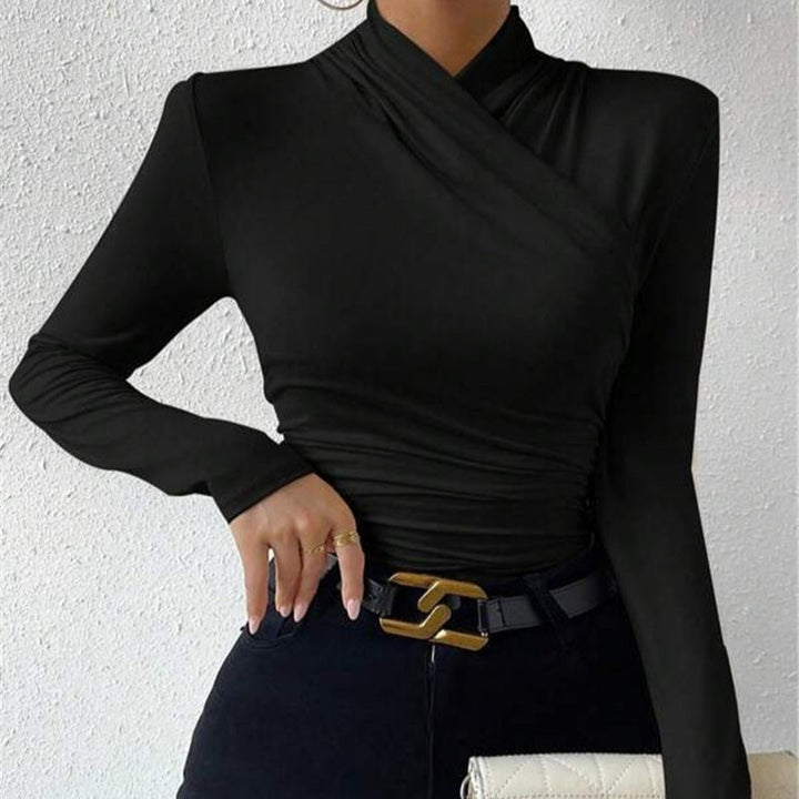 Form-fitting women's long sleeve wrap neck shirt. Ideal elegant top for modern office wear or casual chic styles.
