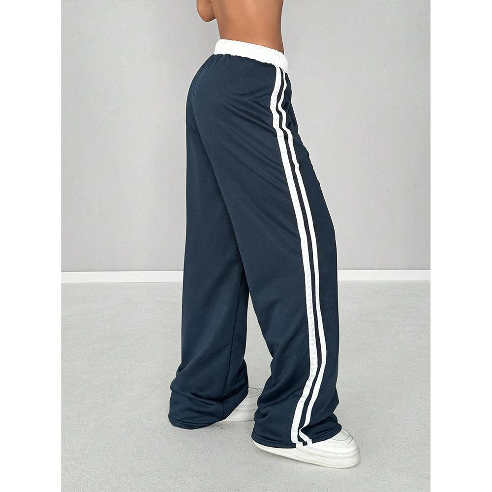High-rise women's striped wide leg trackpants, ideal as comfy loungewear or casual pants with an athletic vibe.