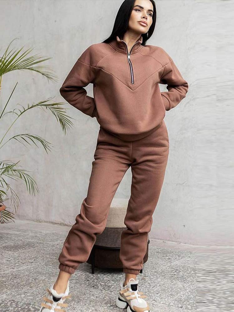 Women's zip neck tracksuit set in a comfortable, relaxed fit. Perfect for casual wear & loungewear.