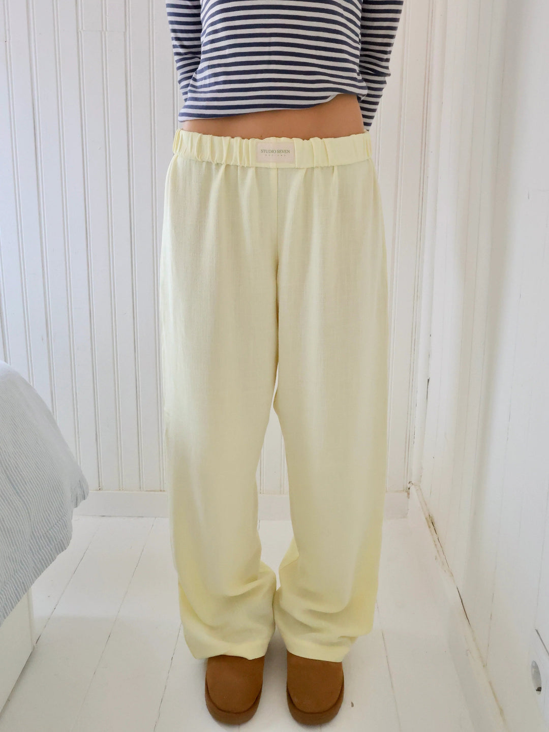Back view of women's relaxed fit lounge pants, showing comfortable elastic waist & relaxed drape.