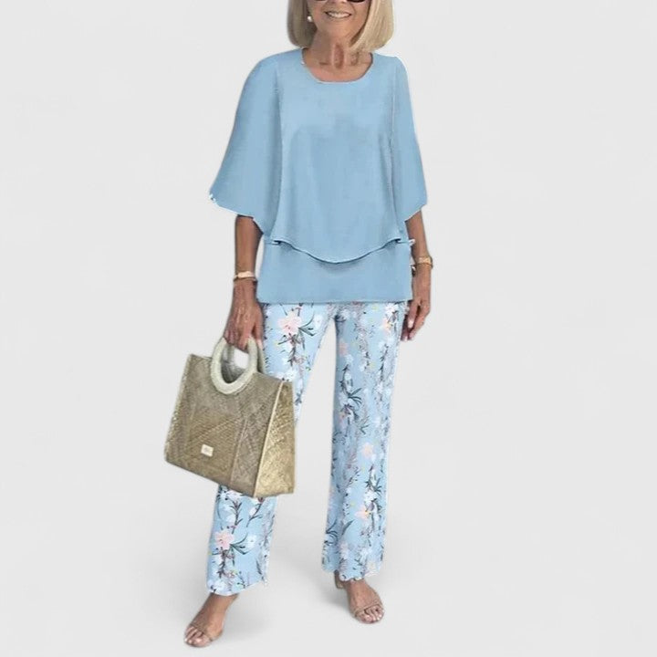 Light sky blue women's top & trousers co-ord. Relaxed fit, perfect for sophisticated summer fashion.