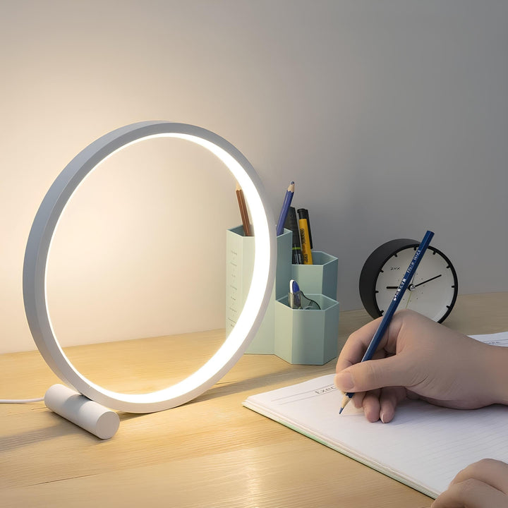 Modern dimmable LED halo ring light, aluminum finish, great for nightstands, bedrooms, or living rooms.