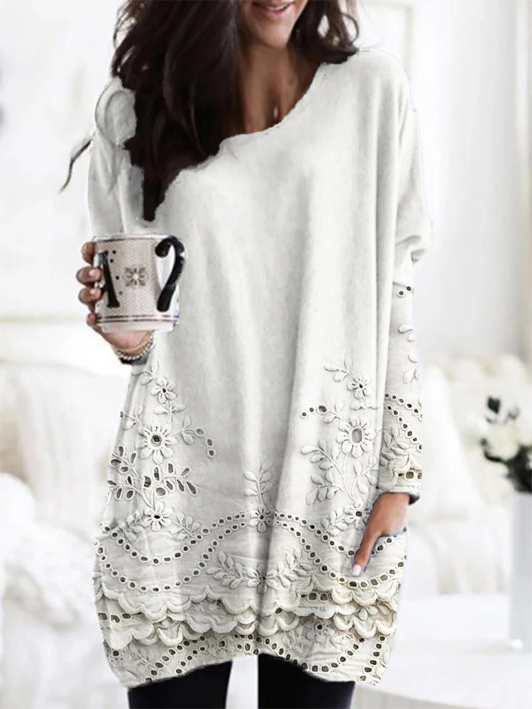 Women's soft printed cozy knit sweater, long sleeve, ideal for stylish casual wear in fall and winter. Relaxed fit.