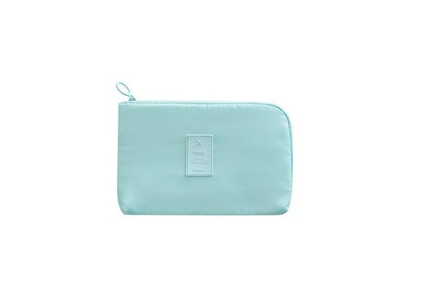 Unisex travel accessory: compact waterproof electronics organizer for all your tech gear.