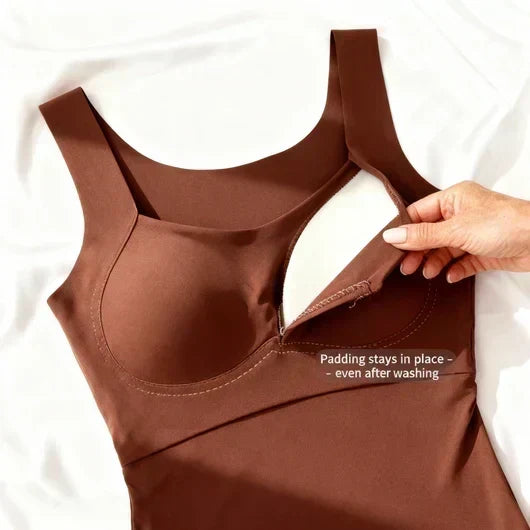 Seamless women's tank top with a supportive built-in bra; no bra needed, ultimate comfort.