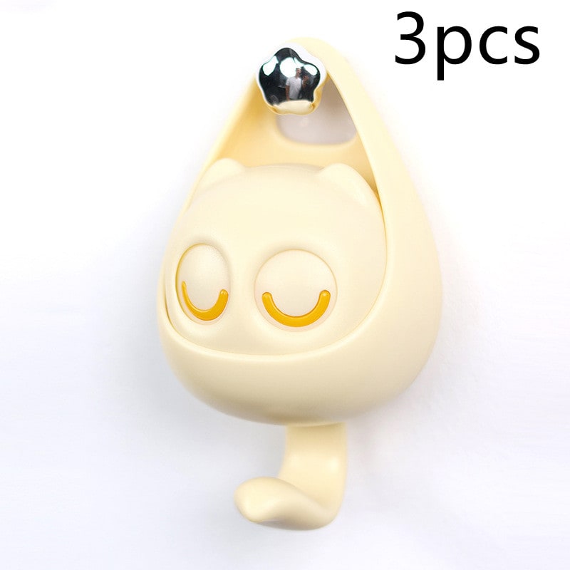 Cute cat eye decor hook for bags & accessories. No drill, easy mount.