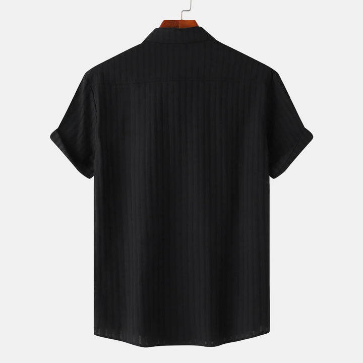 Men's stylish short sleeve button-down shirt. Comfortable, collared, & perfect for versatile smart casual outfits.