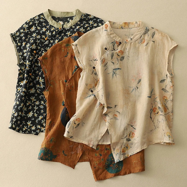 Chic women's summer floral top with a mandarin collar & sleeveless design. Great for vintage-inspired casual wear.